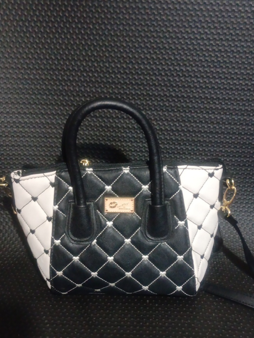 Chic Black and White Quilted Satchel Handbag with Gold Accents